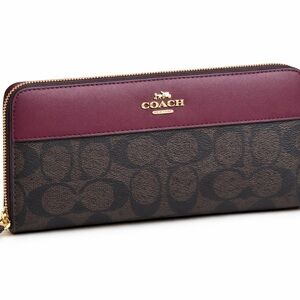 COACH Brown Signature Canvas Continental Wallet with Burgundy Trim
